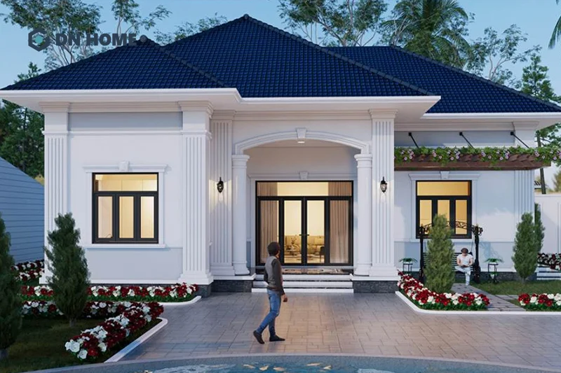 Gam màu trắng cùng các phào chỉ tinh tế giúp tăng thêm vẻ đẹp của nhà chữ L 1 tầng tân cổ điển