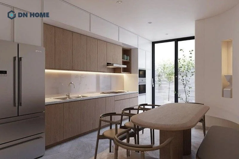 Phòng bếp sử dụng tông màu đồng nhất với phòng khách, tạo sự liền mạch trong tổng thể