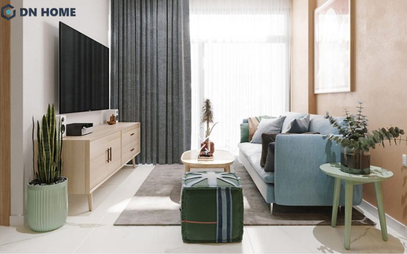 có thể sử dụng thêm chậu cây xanh nhỏ để làm điểm nhấn phòng khách 12m2