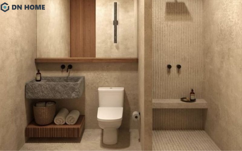 Chất liệu thô mộc như đá, gỗ được sử dụng trong thiết kế phòng tắm 4m2 phong cách Japandi