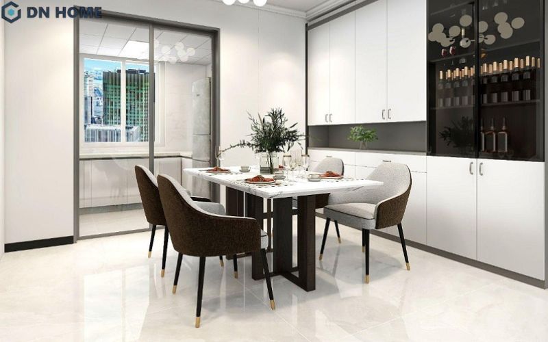 Không gian phòng ăn nhà phố thiết kế hiện đại, nổi bật với đèn trần hình dáng độc đáo