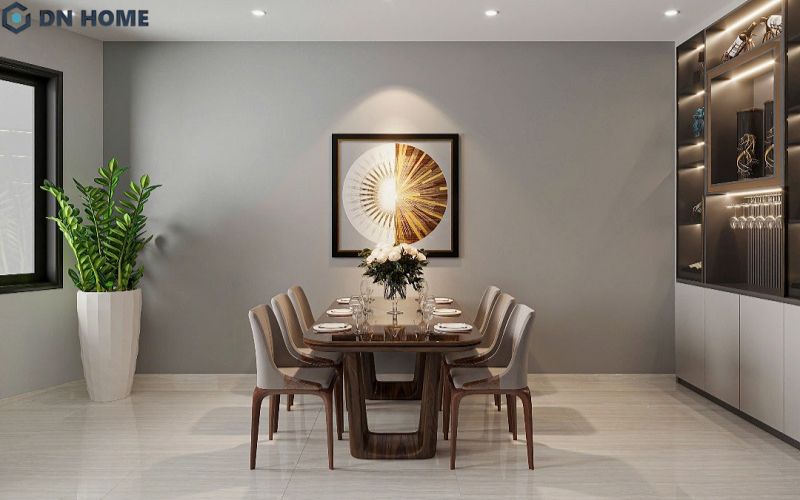 Trang trí không gian phòng ăn bằng tranh treo tường, cây xanh sẽ giúp tổng thể trở nên nổi bật hơn