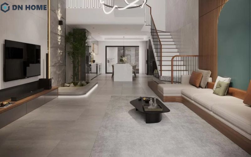 Phòng khách lớn 25m2 nên trang trí thêm thảm, đèn chùm để tránh cảm giác trống trải