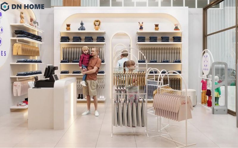 Nên trang trí thêm nhiều yếu tố ngộ nghĩnh, hoạt hình để tạo điểm nhấn cho cửa hàng thời trang trẻ em phong cách tối giản