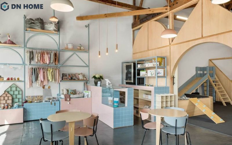 Những đường nét đơn giản được sử dụng trong thiết kế cửa hàng quần áo trẻ em phong cách hiện đại