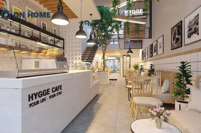 Các gam màu trung tính được sử dụng chủi đạo trong quán cafe ống mặt tiền 6m để tạo cảm giác rộng rãi