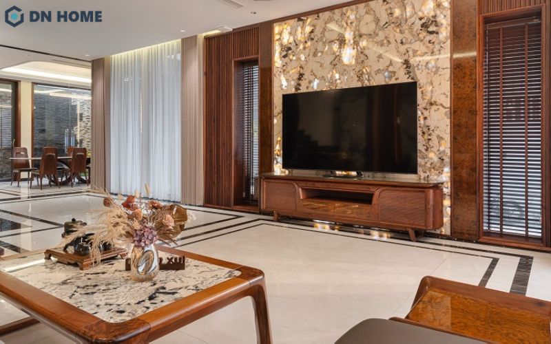 Kệ tivi phòng khách làm từ gỗ tự nhiên đem lại vẻ đẹp sang trọng cho không gian sống