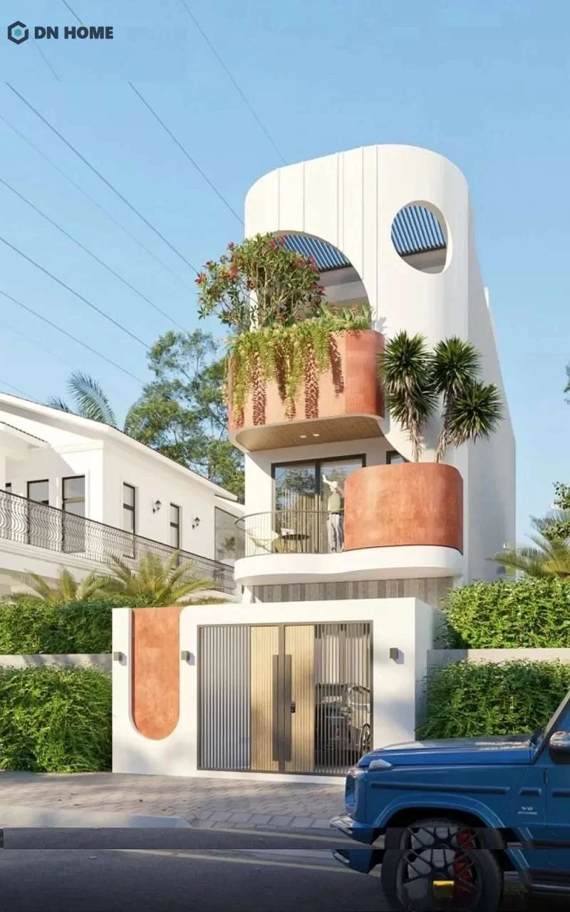 Sử dụng gam màu nổi bật kết hợp trang trí nhiều cây xanh là điểm đặc trưng của mẫu nhà này