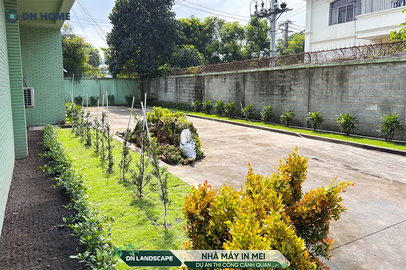 Một góc vườn xanh bên trong nhà máy IN ME! được thi công bởi DN Landscape