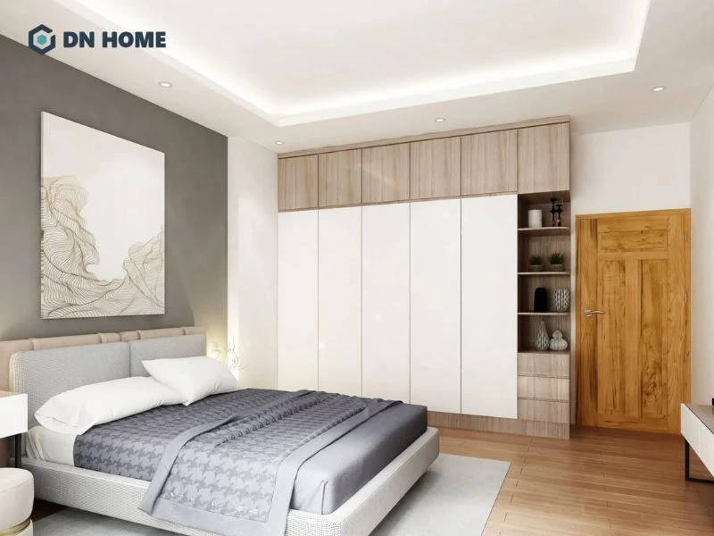 Trang trí thêm tranh trừu tượng để làm nổi bật phòng ngủ