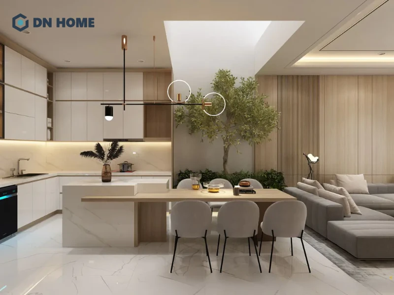 Không gian phòng khách liền bếp trong căn hộ 60m2 được thiết kế mở, tạo cảm giác thoáng đãng