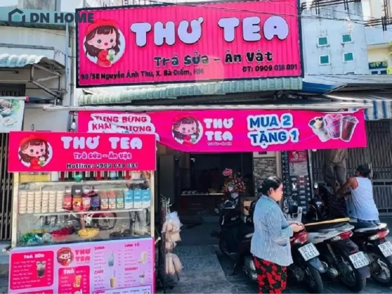 Bảng hiệu tiệm ăn vặt có màu sắc bắt mắt