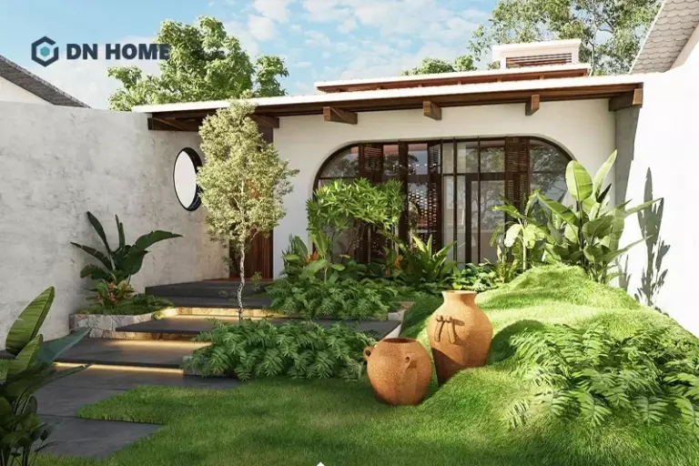 Cây xanh thấp và thảm cỏ xanh thường được ứng dụng trong thiết kế sân vườn trước nhà