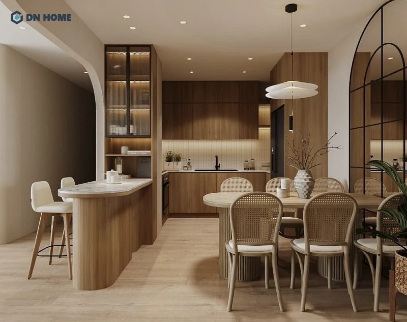 Thiết kế không gian bếp chữ L được đầu tư đầy đủ từ bếp nấu, tủ lạnh âm tường cho đến quầy bar mini thư giãn,...