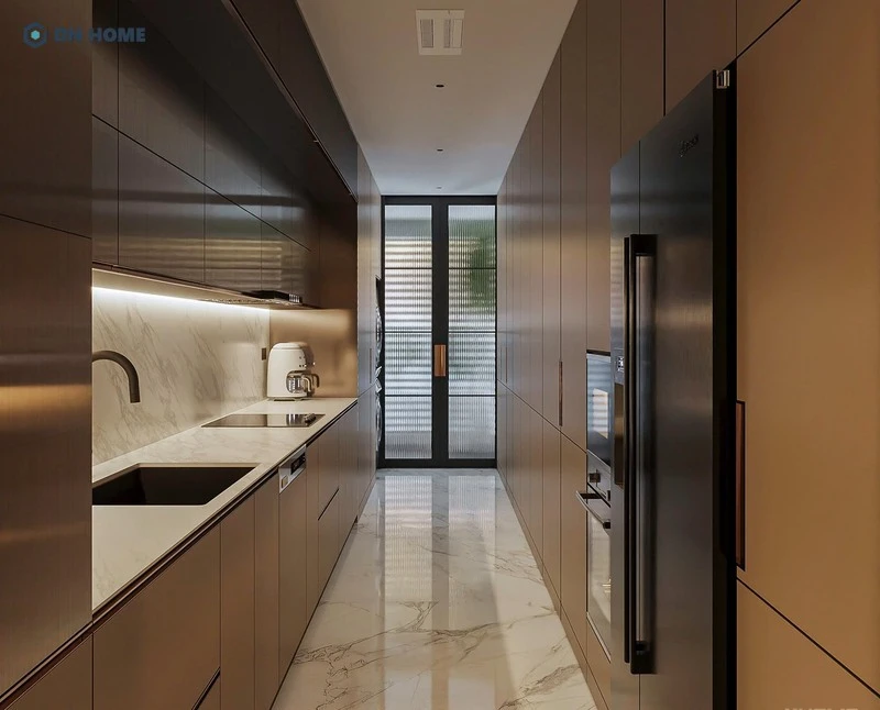 Không gian bếp chung cư 3 phòng ngủ gọn gàng, đội ngũ DN HOME tận dụng tối đa diện tích với thiết kế tủ lạnh âm tường