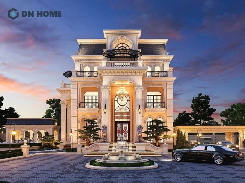 Ánh đèn vàng lung linh vào ban đêm làm nổi bật lên vẻ đẹp của thiết kế biệt thự tân cổ điển kiểu Pháp có gara ô tô