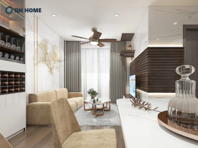 Không gian mở liên kết phòng khách và bếp giúp căn hộ 63m2 trở nên thông thoáng hơn