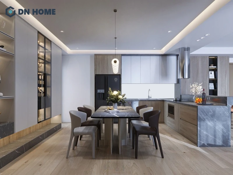 Sự kết hợp hài hoà giữa hệ thống chiếu sáng và ánh sáng tự nhiên góp phần làm cho căn bếp trở nên ấm cúng