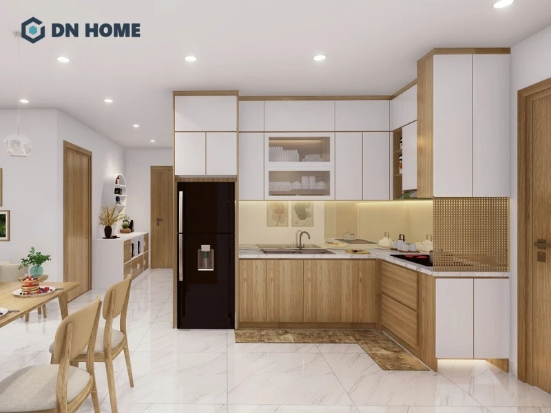 Thiết kế tủ bếp chữ L cao kịch trần giúp tăng diện tích lưu trữ, đồng thời tận dụng một cạnh của tủ bếp là nơi chứa các vật dụng khác