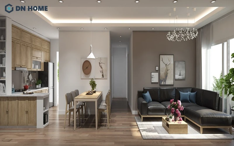 Thiết kế bếp mở, ở giữa là bàn ăn đóng vai trò là vách ngăn tinh tế giữa hai khu vực