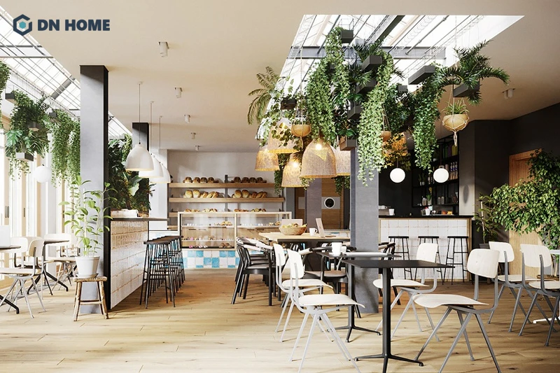 Ánh sáng tự nhiên nhẹ nhàng được tận dụng tối đa trong không gian quán cafe Scandinavian