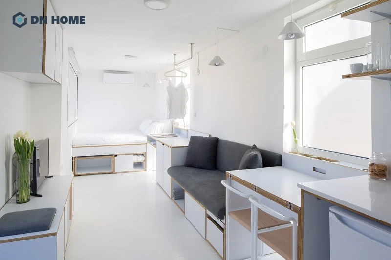 Thiết kế căn hộ 15m2 theo kiểu nhà ống, sử dụng gam màu trắng làm chủ đạo giúp tăng thêm chiều sâu cho không gian