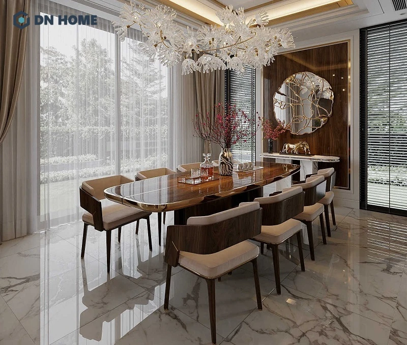 Phòng ăn đặt gần cửa kính lớn mang lại không gian thoáng đãng, tận dụng ánh sáng tự nhiên, giúp bữa ăn thêm thư giãn