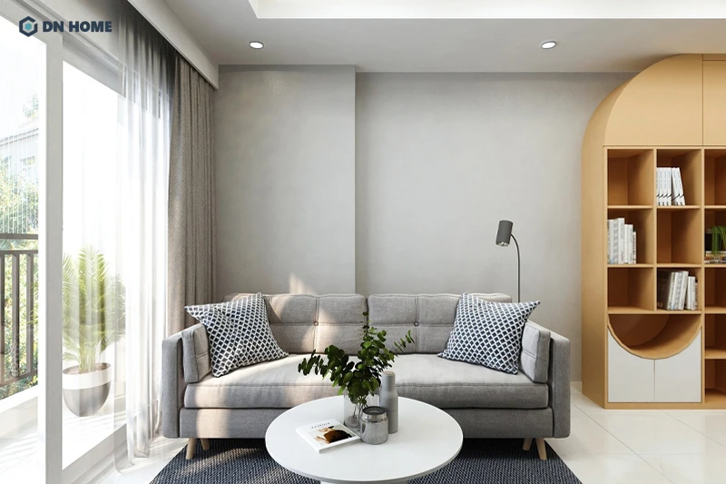 Thảm trải sàn màu xanh đen là điểm nhấn thị giác trong không gian phòng khách chung cư phong cách Color Block