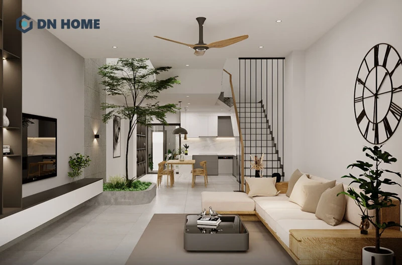Có thể thiết kế giếng trời ở khu vực phân chia phòng khách - bếp liên thông để đạt hiệu quả thông gió, giảm mùi tốt hơn