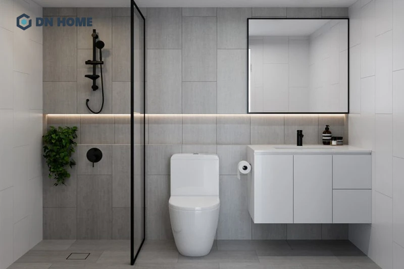 Sự kết hợp 2 màu tương phản trắng - đen tạo điểm nhấn ấn tượng cho phòng tắm nhỏ