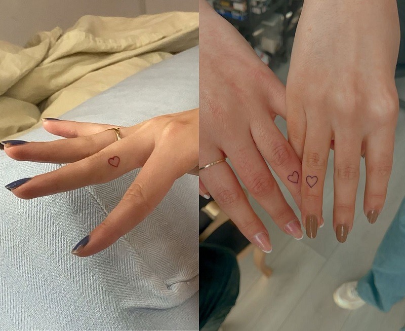 Hình tattoo trái tim mini màu đỏ và đen ở ngón tay đầy tinh tế