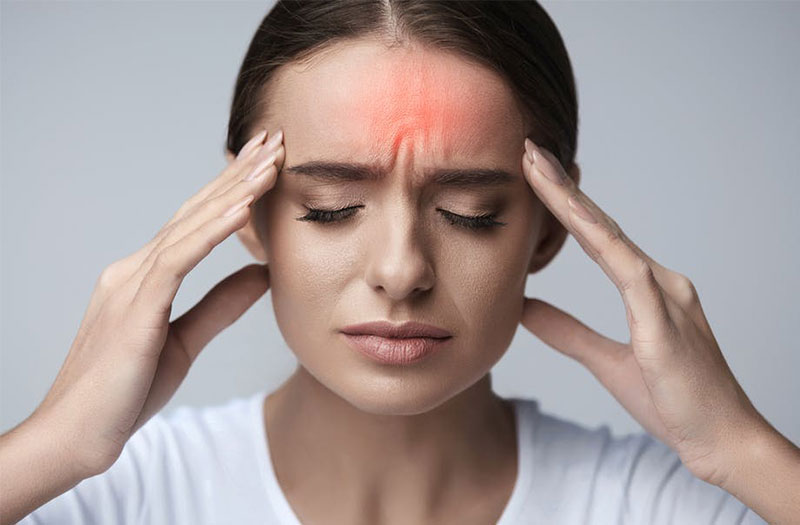 Giảm đau đầu hiệu quả là lợi ích khi dùng ghế massage.