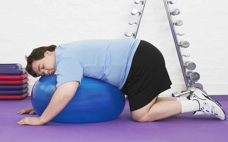 Ít vận động là một trong những nguyên nhân gây tích tụ mỡ bụng.