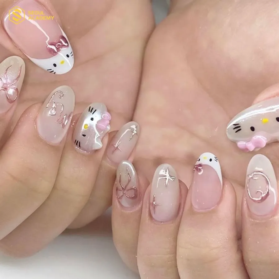 Mẫu nail hello kitty kèm charm nơ hồng là lựa chọn nổi bật cho các cô nàng yêu thích sự bánh bèo dễ thương