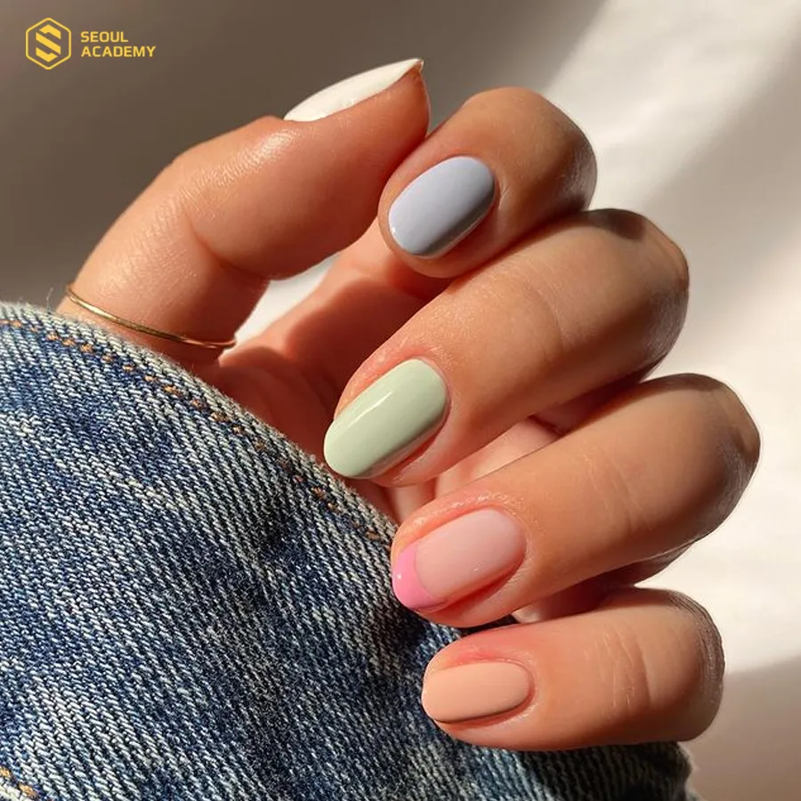 Nhiều màu pastel kết hợp tạo nên mẫu móng nổi bật Nhiều màu pastel kết hợp tạo nên mẫu móng nổi bật