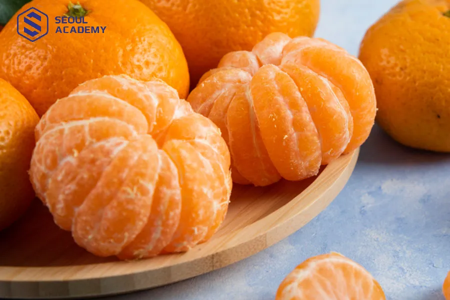 Ăn quýt trong ngày mùng 1 cũng được cho mang lại may mắn