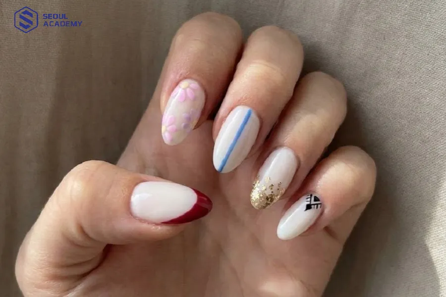 Có thể kết hợp màu trắng sữa cùng nhiều màu khác nhau để tăng thêm sức hút cho bộ móng của bạn Có thể kết hợp màu trắng sữa cùng nhiều màu khác nhau để tăng thêm sức hút cho bộ móng của bạn