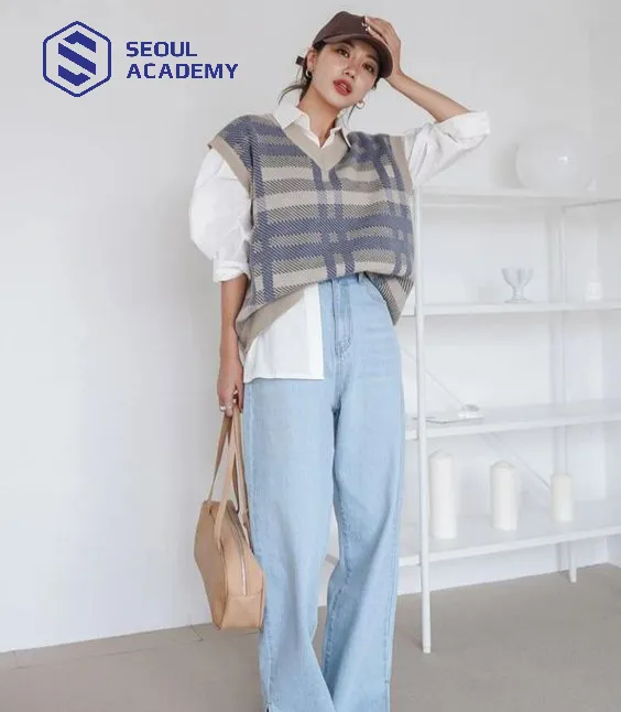 Phối áo gile với quần jean ống rộng dành cho team thích sự thoải mái