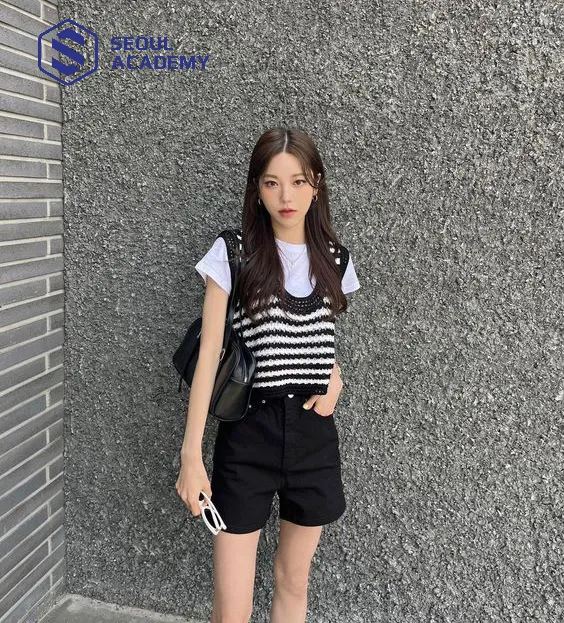 Áo gile có thể mix cùng quần jean ngắn