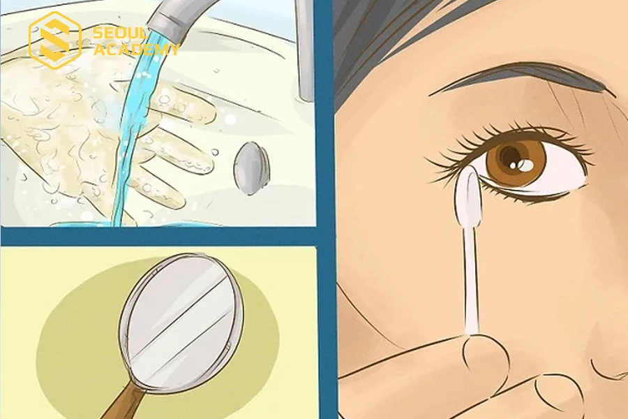 Dùng tăm bông lấy lông mi ra ngoài