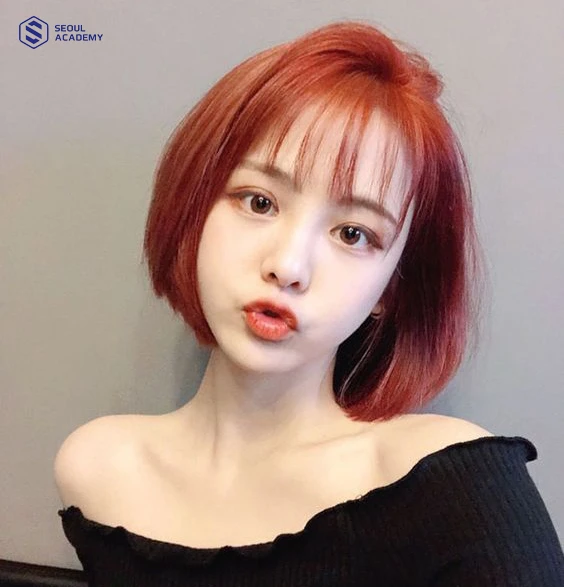 Tóc ngắn nhuộm đỏ cam cực kỳ nổi bật