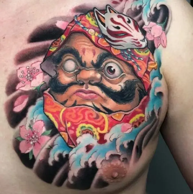 Hình ảnh Daruma với một mắt kết hợp cùng hoa mẫu đơn thể hiện quyết tâm đạt được mục tiêu