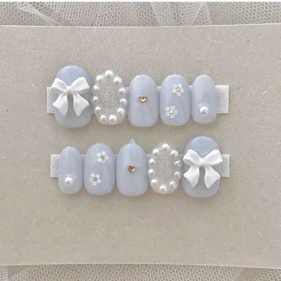 Nail nơ trắng nail xanh ấn tượng
