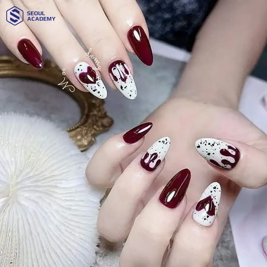 Mẫu nail sơn màu đỏ mận lạ mắt năm nay