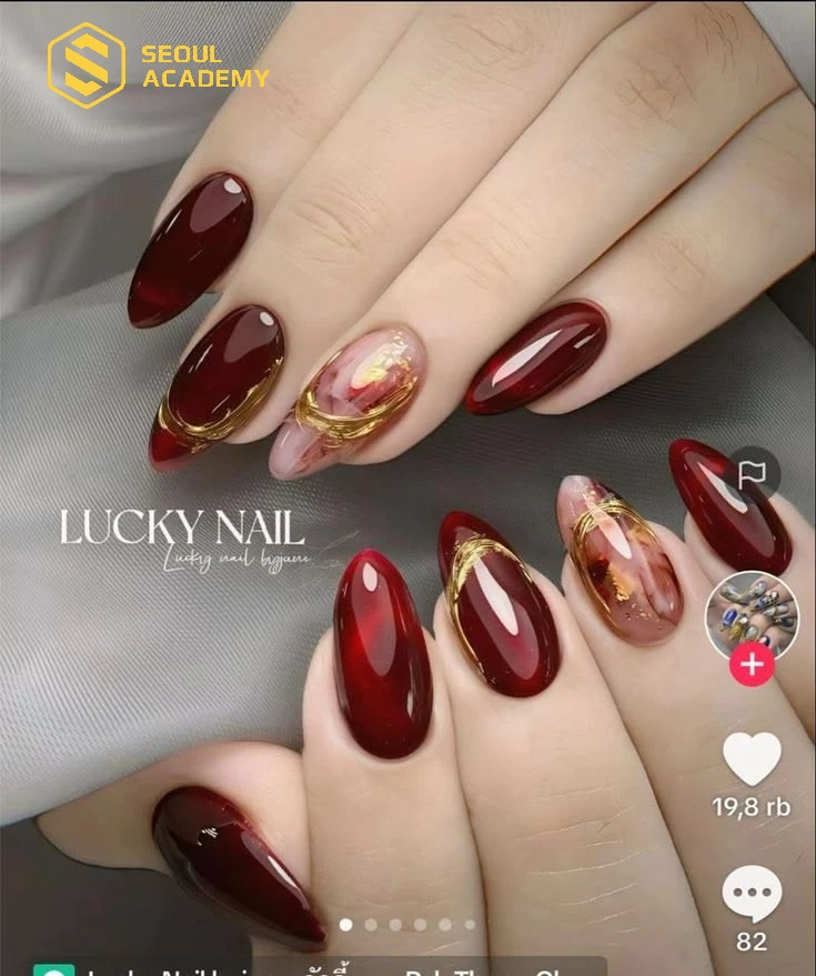 Mẫu nail màu đỏ tráng gương nổi bật cho cô dâu