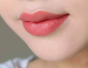 Xăm môi màu gì đẹp 9 Xăm môi màu gì đẹp Cam san hô là màu môi đẹp dành cho những cô nàng nhẹ nhàng
