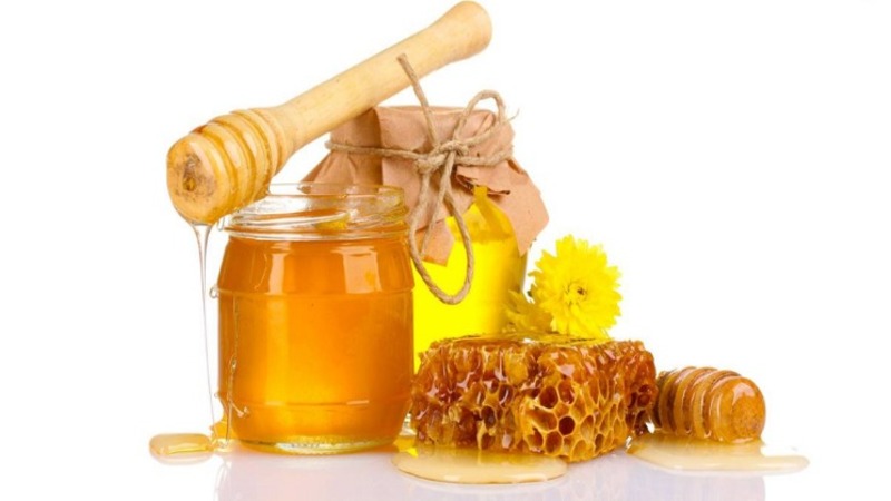 Mật ong nguyên chất và đường nâu giúp loại bỏ lông mặt hiệu quả